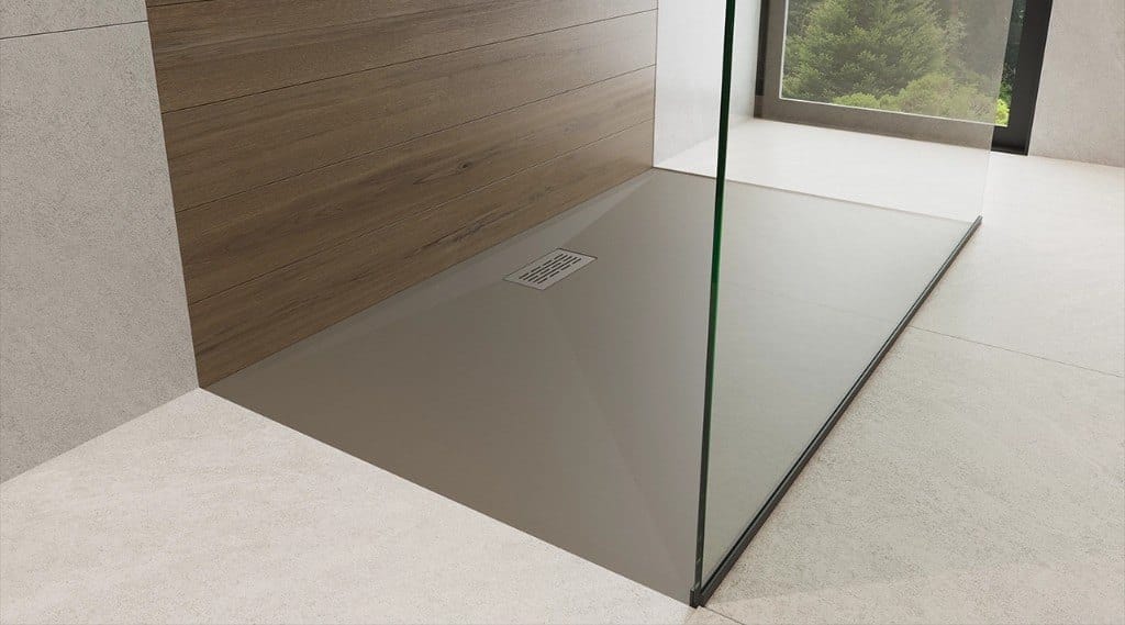 UpHome shower pan base collection with a low-profile barrier-free entry, glass panel, and wood-look wall finish.